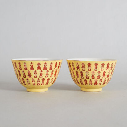 A Pair of Chinese Yellow-ground Iron-red 'Xi' Bowls (Da Qing Guangxu Nian Zhi Mark)