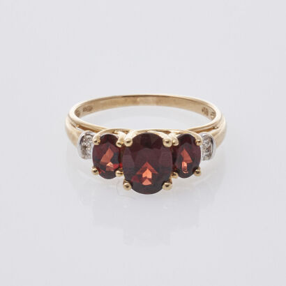 9ct Three Stone Garnet and Diamond Ring