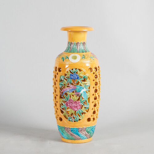 A Carved Chinese Yellow-Ground Famille Rose 'Floral' Vase (Da Qing Qianlong Nian Zhi Mark)