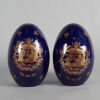 A Pair of Chinese Blue-Glazed Gilt-Decorated 'FIgural' Egg-Shaped Ornaments