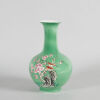 A Chinese Green-Ground Famille Rose ‘Floral and Bird’ Vase (Qianlong Nian Zhi Mark)