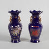 A Pair of Chinese Blue-Glazed Gilt-Decorated 'Floral' Vases with Two Handles