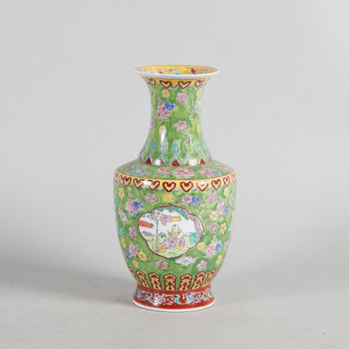 A Chinese Green-Ground Famille Rose 'Floral' Vase (Da Qing Qianlong Nian Zhi Mark)