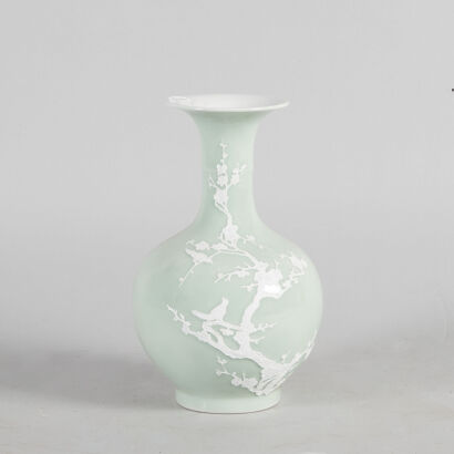 A Carved Chinese Green-Enameled ‘Floral and Bird’ Vase (Da Qing Qianlong Nian Zhi Mark)