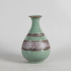 A Carved Chinese Green-glazed Crackled Vase (Guan Mark)