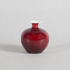 A Small Chinese Red-Glazed Vase (Jingdezhen Zhi Mark)