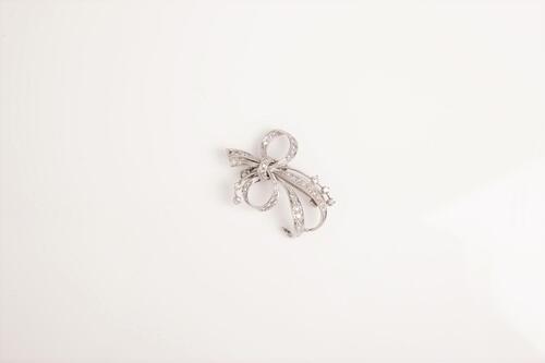 A Platinum and Diamond Bow Brooch