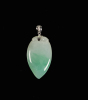 A Jadeite Pendant with White Gold Bale Set and Three Diamonds