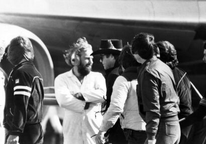 Elton John surrounded by security arriving in Wellington