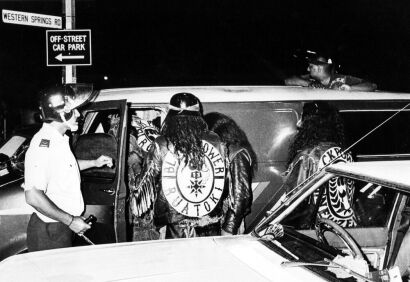 Police removing Black Power members outside the ZZ Top concert in Auckland