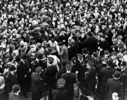 Crowd waiting for the Beatles arrival at the Clarendon Hotel