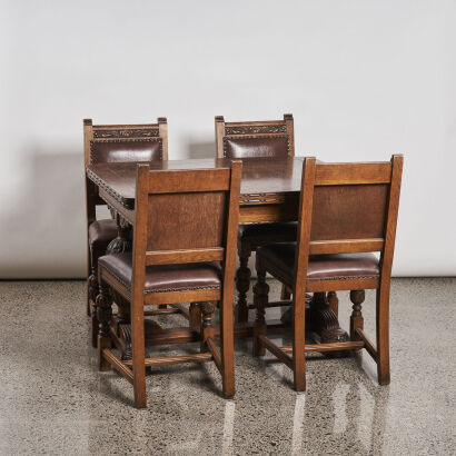 An Antique Five Piece Oak Dining Suite