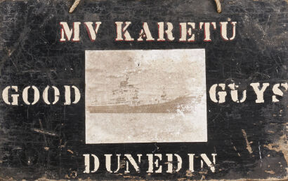 An MV Karetu Good Guys Dunedin Wooden Sign