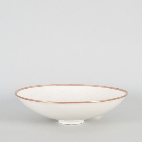 A Chinese White-Glazed Moulded 'Fish' Bowl