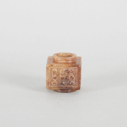 A Chinese Archaistic Brown Jade Cong