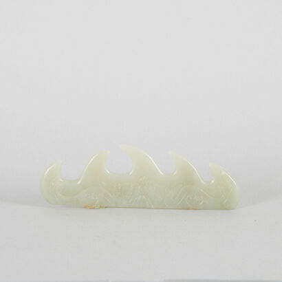 A Chinese Celadon Jade Brush Rest in the form of Moutain