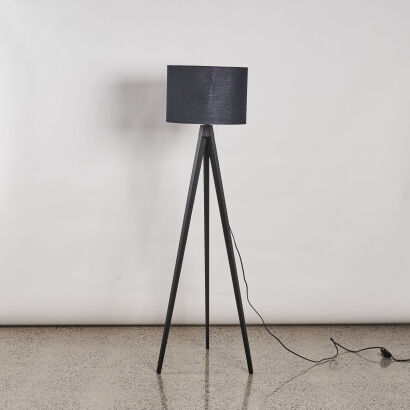 A Floor Standing Tripod Lamp