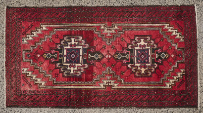 A Hand-Knotted Wool Pile Iranian Shiraz Rug