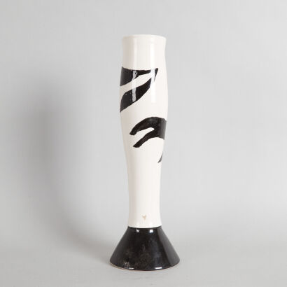 A Tall Stem Black And White Vase