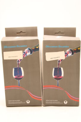 (2) Casual Olecranon Decanter Drainage Device (GB)