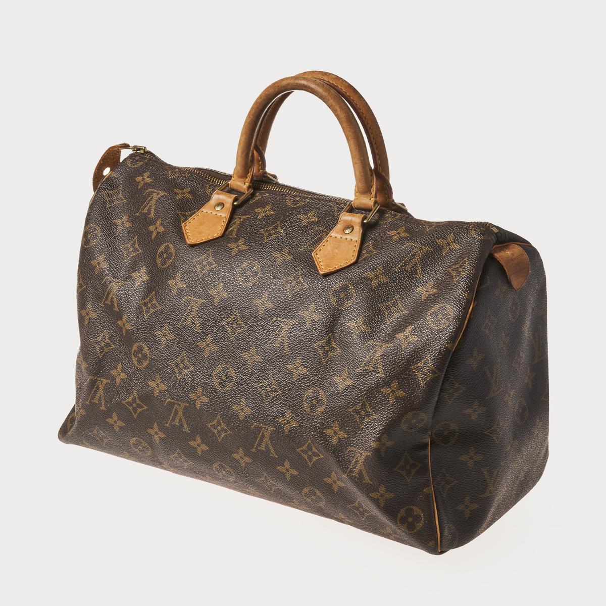 Sold at Auction: LOUIS VUITTON Handbag SPEEDY 35.