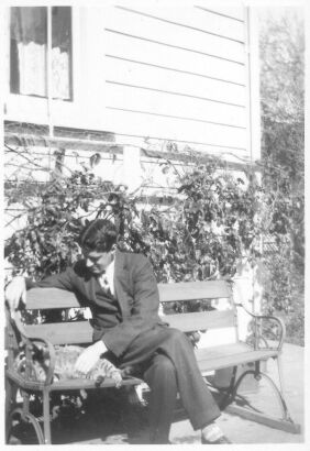 PHOTOGRAPHER UNKNOWN Lawrence Baigent with Cat