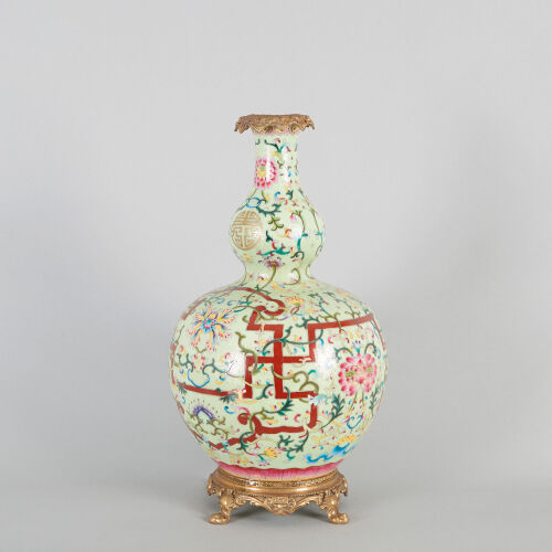 A Chinese Lime-Ground Famille Rose Double-Gourd Vase(Da Qing Qianlong Nian Zhi Mark, drilled)