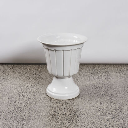 A Large White Ceramic Urn