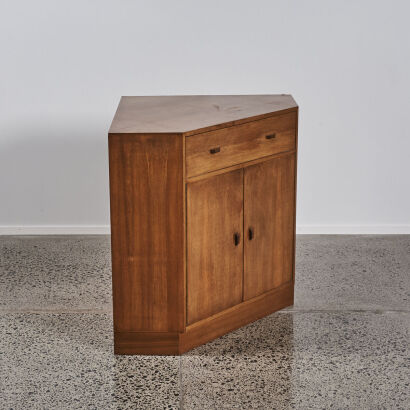 A Mid Century Walnut And Mahogany Corner Cabinet