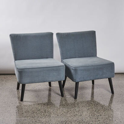 A Pair of Contemporary Lounge Chairs in Teal Fabric