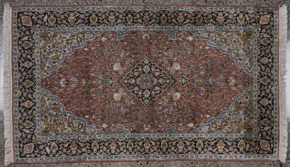 A Persian Hand Knotted Rug