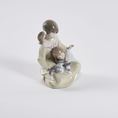 A Lladro Figure Group