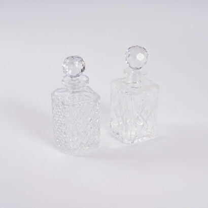 A Royal Doulton Crystal Decanter and One Other