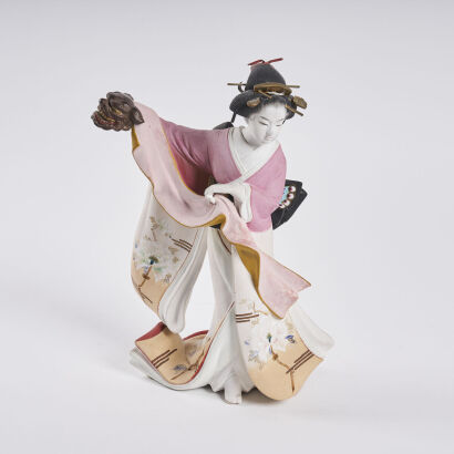 A Japanese Geisha Porcelain Figure