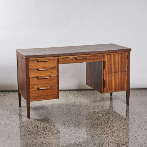 A Mid Century Leather Top Desk in Mahogany