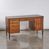 A Mid Century Leather Top Desk in Mahogany