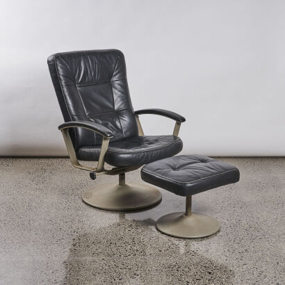 A Leather Recliner And Foot Stool