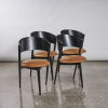 A Set Of Four Mid-Century Tripod Chairs With Formed Ply Back