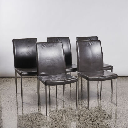 A Set Of Five Chocolate Leather Dining Chairs