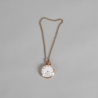 An American Elgin Gold Pocket Watch and 15ct Chain