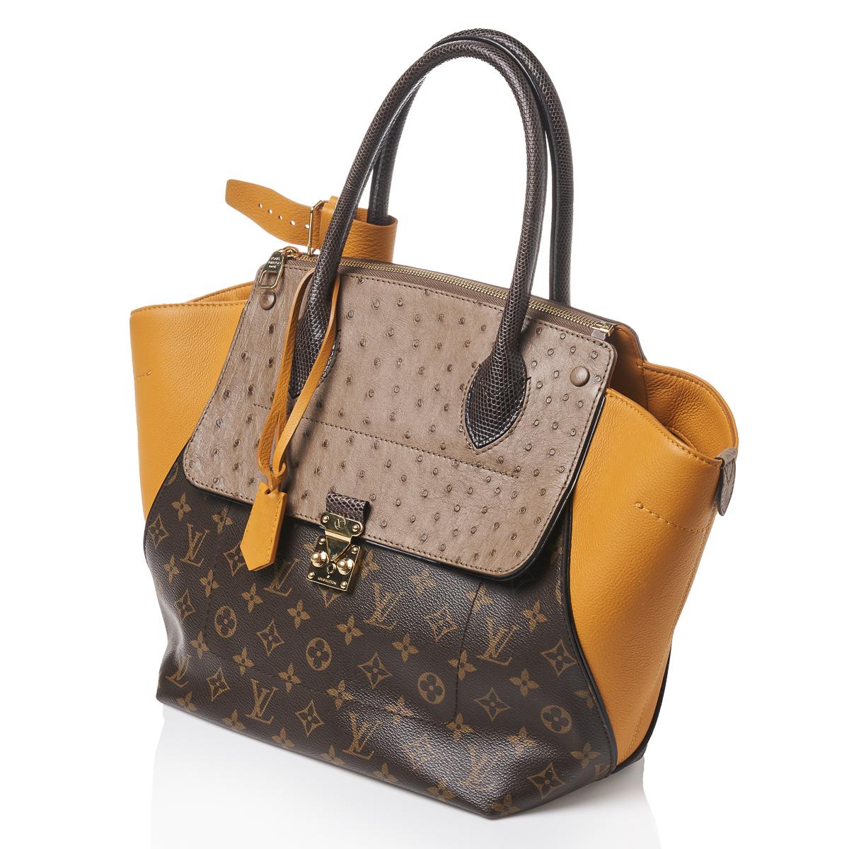 At Auction: Louis Vuitton, LOUIS VUITTON Shoulder Bag KALAHARI PM.