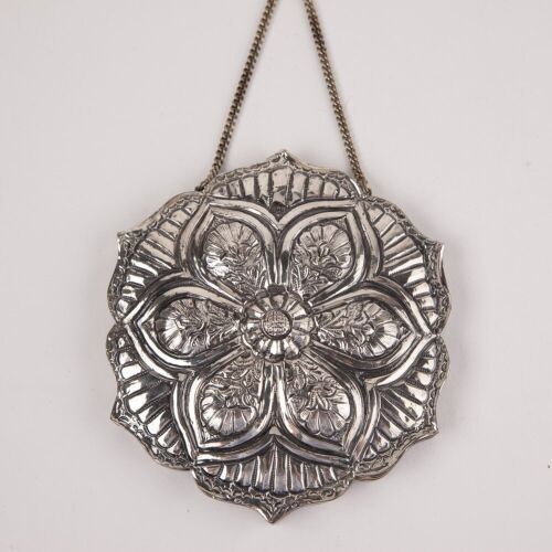 A Middle-Eastern Silver Flower-Shaped Mirror