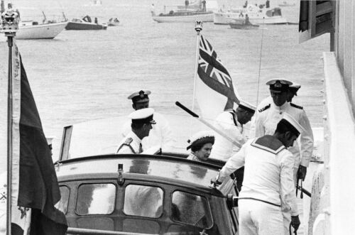 The Queen arrives at Devonport Wharf aboard Royal Barge