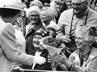 The Queen accepting flowers