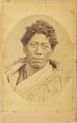 AMERICAN PHOTOGRAPHIC COMPANY, AUCKLAND Oval portrait of a Māori man with moko, wearing a Para kiekie