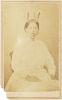 AMERICAN PHOTOGRAPHIC COMPANY AUCKLAND Portrait of Māori woman seated in Victorian dress with moko