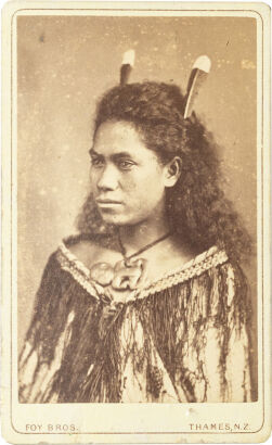 FOY BROS, THAMES Portrait of Māori woman with hei tiki, korowai cloak and two Huia feathers