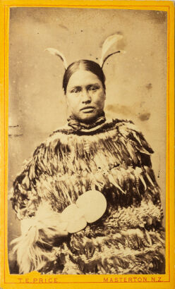 THOMAS E. PRICE, MASTERTON Portrait of a Māori woman with feather cloak and bone mere