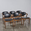 A Suite Of Mid-Century Oak Chairs