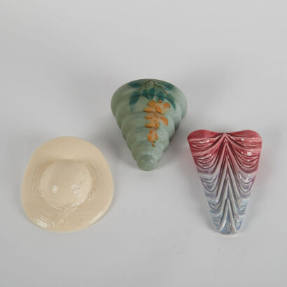 A Collection of Three Wall Vases